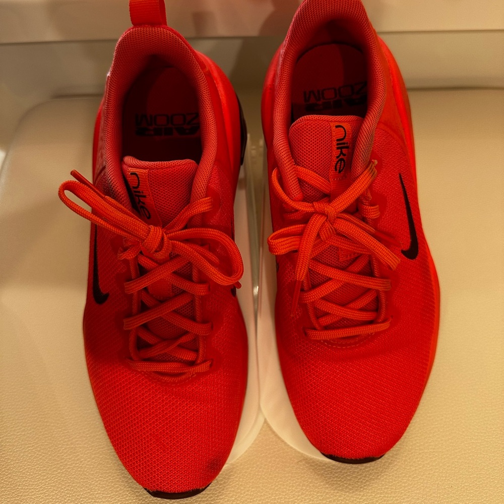 Nike Orange Bella Trainer 7 with Black Swoosh size 8 worn twice